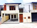Newly completed 3 storey house with 7.5 perches roof top facing a beautiful dam near Malabe Welivita